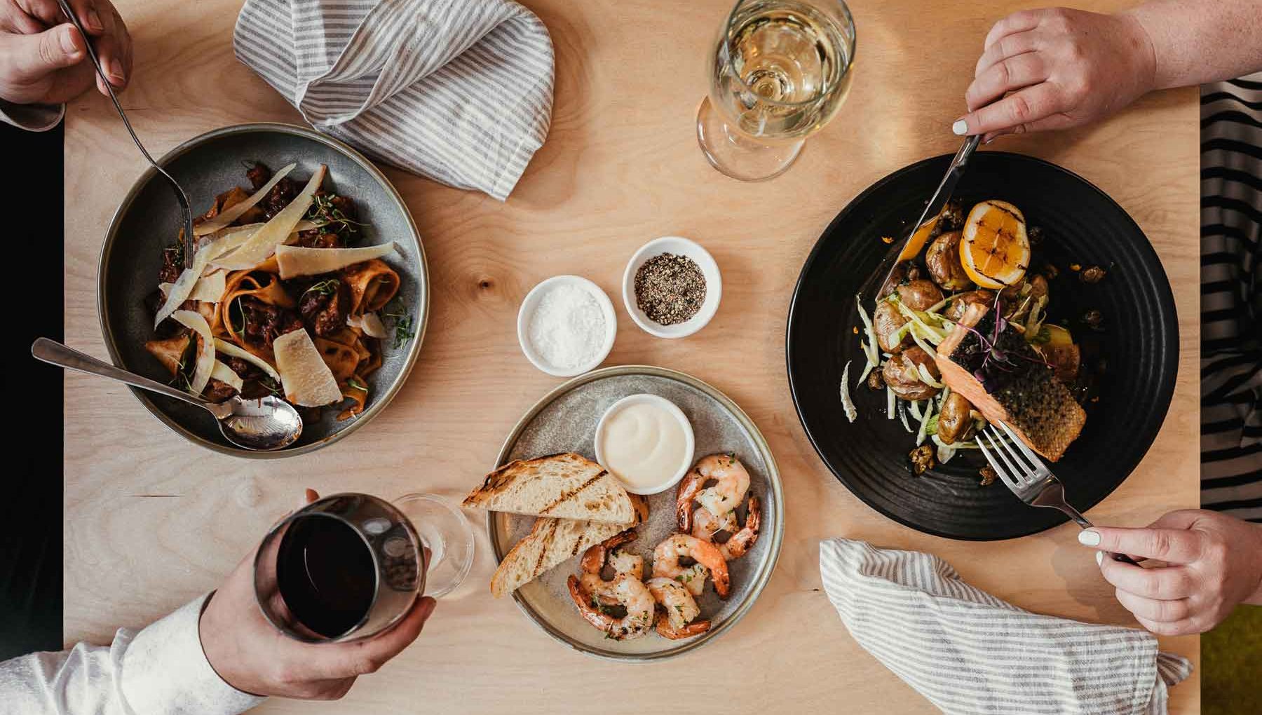 Atura Wellington - Couple Sharing Food